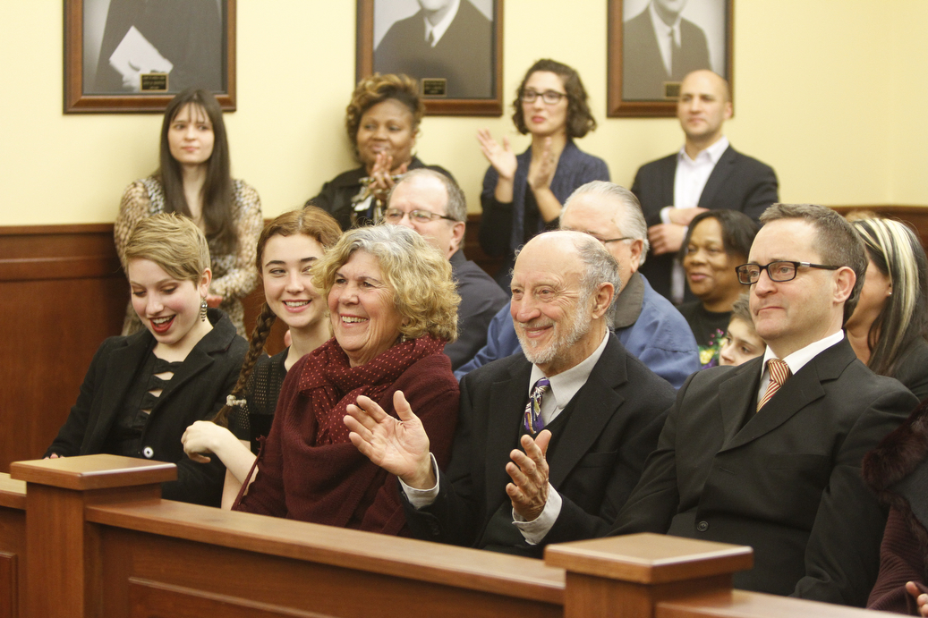        ROBERT K. YOSAY  | THE VINDICATOR...THe honorable Cheryl Waite...presided over the swearing in  of  Michele Hagan LePore  with her husband Robert Hagan and son Jimmie - and Daughter Natalia .....crowd of onlookers .