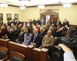        ROBERT K. YOSAY  | THE VINDICATOR...THe honorable Cheryl Waite...presided over the swearing in  of  Michele Hagan LePore  with her husband Robert Hagan and son Jimmie - and Daughter Natalia .....crowd of onlookers .