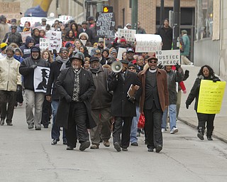        ROBERT K. YOSAY  | THE VINDICATOR..Heading towards city hall..A peace march took place protesting police actions in cases surrounding the deaths of Michael Brown, Michael Garner, Tamir Rice, and others across the country from the Federal Courthouse on Commerce and WIck to City Hall to Mahoning County Courthouse .
