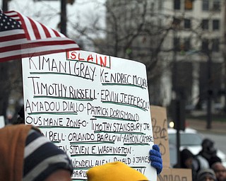        ROBERT K. YOSAY  | THE VINDICATOR...A peace march took place protesting police actions in cases surrounding the deaths of Michael Brown, Michael Garner, Tamir Rice, and others across the country from the Federal Courthouse on Commerce and WIck to City Hall to Mahoning County Courthouse .