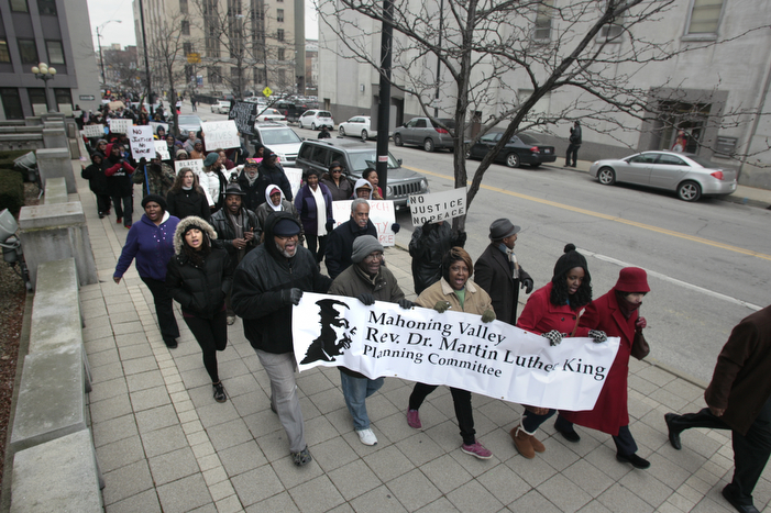        ROBERT K. YOSAY  | THE VINDICATOR...A peace march took place protesting police actions in cases surrounding the deaths of Michael Brown, Michael Garner, Tamir Rice, and others across the country from the Federal Courthouse on Commerce and WIck to City Hall to Mahoning County Courthouse .