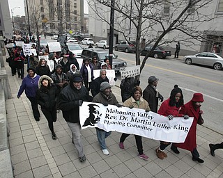        ROBERT K. YOSAY  | THE VINDICATOR...A peace march took place protesting police actions in cases surrounding the deaths of Michael Brown, Michael Garner, Tamir Rice, and others across the country from the Federal Courthouse on Commerce and WIck to City Hall to Mahoning County Courthouse .