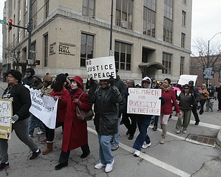        ROBERT K. YOSAY  | THE VINDICATOR..A peace march took place protesting police actions in cases surrounding the deaths of Michael Brown, Michael Garner, Tamir Rice, and others across the country from the Federal Courthouse on Commerce and WIck to City Hall to Mahoning County Courthouse .