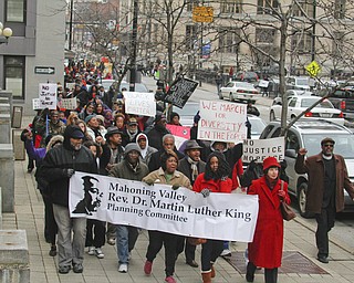        ROBERT K. YOSAY  | THE VINDICATOR..A peace march took place protesting police actions in cases surrounding the deaths of Michael Brown, Michael Garner, Tamir Rice, and others across the country from the Federal Courthouse on Commerce and WIck to City Hall to Mahoning County Courthouse .