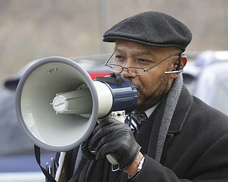        ROBERT K. YOSAY  | THE VINDICATOR..Rev Kenneth Simon ..A peace march took place protesting police actions in cases surrounding the deaths of Michael Brown, Michael Garner, Tamir Rice, and others across the country from the Federal Courthouse on Commerce and WIck to City Hall to Mahoning County Courthouse .