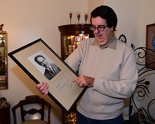 YOUNGSTOWN, OHIO - DECEMBER 22, 2014: Autograph collector David Powers shows off a autograph from Harry Houdini Monday afternoon at his Youngstown home. (Photo by David Dermer/Youngstown Vindicator)