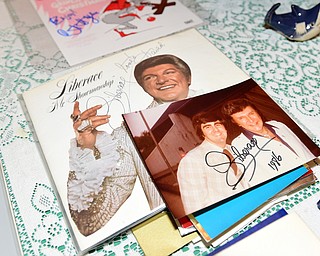 YOUNGSTOWN, OHIO - DECEMBER 22, 2014: Some of autograph collectors David Powers autographed Liberace memorabilia Monday afternoon at his Youngstown home. (Photo by David Dermer/Youngstown Vindicator)