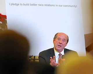 Jeff Lange | The Vindicator  Tom Humphries of the Regional Chamber of Commerce looks at the crowd as he answers questions about racism in Youngstown, Monday evening at Union Baptist Church during a community forum.