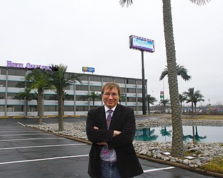        ROBERT K. YOSAY  | THE VINDICATOR..Sebastian Rucci outside his new signs and hotel do to open in January .