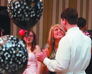        ROBERT K. YOSAY  | THE VINDICATOR..having a dance....  as Jordan Welliver and Gaige Figinsky... both jrs... ..Students at Summit Academy had a pre prom at the Downtown YMCA as students got preped at the school on Oakland Ave....                            -30-