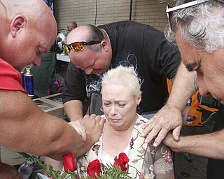 William D Lewis the vindicator  Fat and Furious cast members from left: Steve McGranahan, Chuck Kountz and Andy Pivarnik lay on hands and pray with cancer patient Debbie Glover of Canfield during a North Lima car show held to raise funds for Grover Sunday 8-17-14.