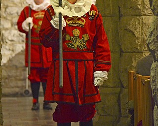 Katie Rickman | the Vindicator.Bill Watson plays the part of a beefeater, he stands in an isle way during the 54th annual Boar's Head & Yule Log Fesitval at St. John's Episcopal Church on Sunday, Jan. 4, 2014.