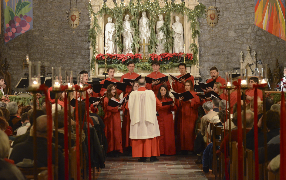 Katie Rickman | The Vindicator.A choir performs during the 54th annual Boar's Head & Yule Log Fesitval at St. John's Episcopal Church on Sunday, Jan. 4, 2014.