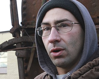 William D. Lewis The Vindicator Rick Rowlands of the Youngstown Steel Heritage Museum inspects a  1937 narrow gauge steam locomotive that was used in the Pittsburgh industry. The locomotive was moved from Middlefield Oh, 12-30-14 to the Youngstown Steel Heritage Museum on Hubbard Rd where it will be restored.