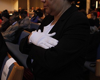 Usher Yvonne Wilson prays with the congregation during the Emancipation Proclamation and Installment service at the New Bethel Baptist Church in Youngstown on Thursday morning.  Dustin Livesay  |  The Vindicator  1/1/15  Youngstown, Ohio.