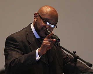 Rev. Kenneth Simon gives a welcome to the congregation during the Emancipation Proclamation and Installment service at the New Bethel Baptist Church in Youngstown on Thursday morning.  Dustin Livesay  |  The Vindicator  1/1/15  Youngstown, Ohio.