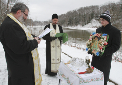 William D. Lewis The Vindicator  Rev. Thomas Constantine, left, Rev Andrew Nelko of St John the Baptist in Campbell and Antonios Constantine during annual Orthodox Blessing of the Water at Mill Creek Park  Tuesday 1-6-15.