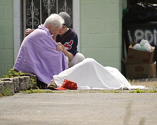        ROBERT K. YOSAY  | THE VINDICATOR...On Midland just after-noon  -- a body found in  a parking lot.. ...  -30-