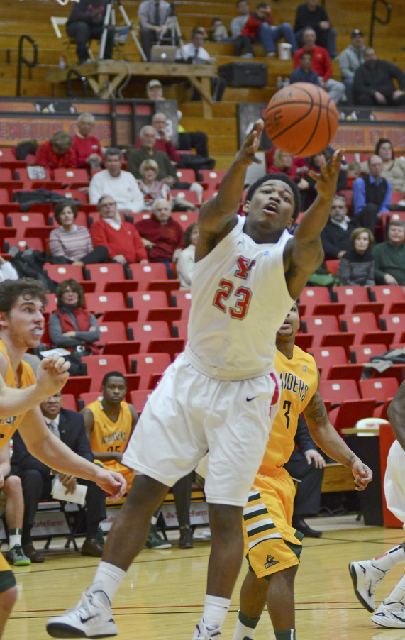 Katie Rickman | The Vindicator.Youngstown's Osandai Vaughn (23) catches a rebound during the first period at Youngstown State's game against Wright State on Jan. 8, 2015.