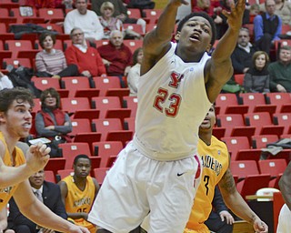 Katie Rickman | The Vindicator.Youngstown's Osandai Vaughn (23) catches a rebound during the first period at Youngstown State's game against Wright State on Jan. 8, 2015.