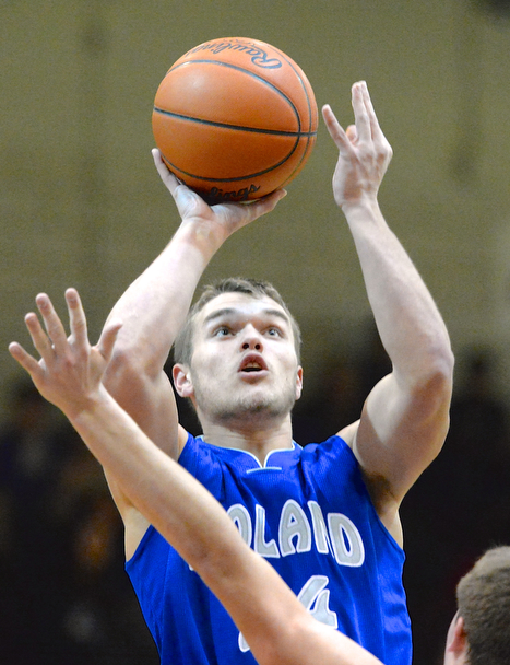 Jeff Lange | The Vindicator  Poland's Austin Wilson looks to the basket as he goes for a two in the second half of their matchup with Boardman, Friday night.