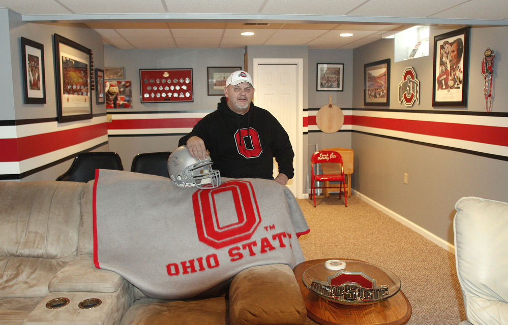        ROBERT K. YOSAY  | THE VINDICATOR..OSU Buckeye Fan Jim Mullally  of Poland and his basement painted scarlet and gay and archie griffin signed helmet