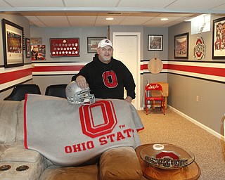        ROBERT K. YOSAY  | THE VINDICATOR..OSU Buckeye Fan Jim Mullally  of Poland and his basement painted scarlet and gay and archie griffin signed helmet
