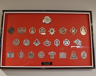        ROBERT K. YOSAY  | THE VINDICATOR..OSU Buckeye Fan Jim Mullally  of Poland and his collection of OSU ornaments.. on the wall