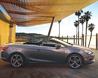 This undated product image provided courtesy of General Motors shows the Buick Cascada convertible, which was unveiled Sunday, in Detroit. Automakers are rolling out new convertible models at a time when many consumers are gaining confidence in the economy and have more money to spend on less practical big-ticket items thanks to juicy stock market returns.