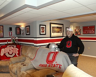        ROBERT K. YOSAY  | THE VINDICATOR..OSU Buckeye Fan Jim Mullally  of Poland and his basement painted scarlet and gay and archie griffin signed helmet