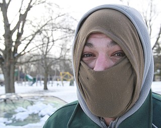 William D. Lewis the Vindicator  Patrick McGrogan of Girard  keeps his face covered while sledding at Mill Creek PArk 1-7-15.