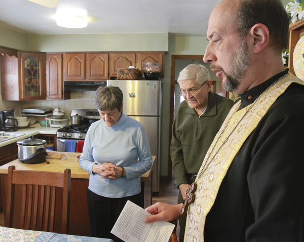 William D Lewis the Vindicator Rev Andrew Nelko,pastor St John the Baptish Orthodox Church in Campbell blesses house of Tom andsonja Harvischak of Campbell 1-8-15..