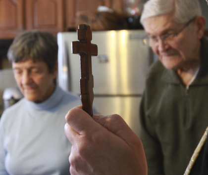 William D Lewis the Vindicator Rev Andrew Nelko,pastor St John the Baptish Orthodox Church in Campbell blesses house of Tom andsonja Harvischak of Campbell 1-8-15.