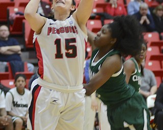 Katie Rickman | The Vindicator.Youngstown's Heidi Schlegel (15) shoots scores the first two points for YSU at Cleveland State's Brooke Smith (12) attempts to block her shot on Thursday, Jan. 15, 2015.