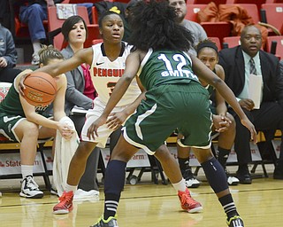 Katie Rickman | The Vindicator.Youngstown's Indiya Benjamin (3) looks for an open pass as Cleveland State's Brooke Smith guards her during the first period at the game at the Beegley Center on Thursday, Jan. 15, 2015.