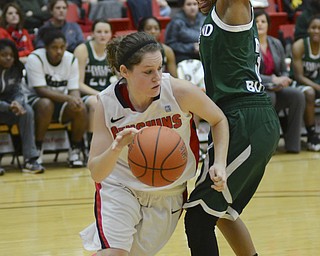 Katie Rickman | The Vindicator.Yougnstown's Jenna Hirsch (32) maneuvers around Cleveland State's Chrishna Butler (3) during the first period of the game at the Beegley Center on January 15, 2015.