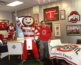        ROBERT K. YOSAY  | THE VINDICATOR..Sam Covelli and his BUCKEYE ROOM at the Covelli HQ in Warren- His best BUD  --- Brutus is from the origional St Johns Arena.