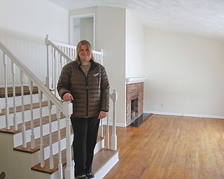       ROBERT K. YOSAY  | THE VINDICATOR...Burgan Realty at a house at 3793 Ayrshire Drive in Austintown.. Tabitha Matheney - real estate trends ..inside the living area..