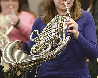 Katie Rickman | The Vindicator.Annie Thiese, a Music Education student from Kent State University warms up on her horn during the 3rd Annual YSU Horn Workshop on Sunday, Jan. 11, 2015.