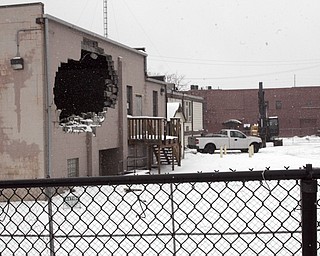        ROBERT K. YOSAY  | THE VINDICATOR..YSU says the former United Brotherhood of Carpenters and Joiners of America Local 171 union hall at 348 W. Rayen Ave., next to Charlie Staples Bar-B-Que, is scheduled for razing Monday. .