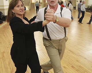 William D. Lewis The Vindicator  Joe Sepesy and Lynda McPhail dance at Tyler History Center in Youngstown 1-12-15.