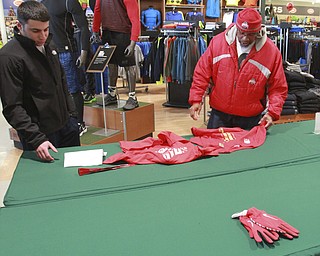 William D Leiws the vindicator  Joe Mineo of Struthers and Jim Cecil of Campbell look for OSU merch at Dicks in Boardman  Tuesday 1-13-15. The store sold out of most of its OSU gear early Tuesday.