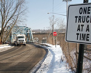 This structurally deficient, 1939 steel-truss bridge that carries Division Street over the Mahoning River will be razed and replaced this year. Its 22-foot-wide roadway is too narrow for the area’s truck traffic, according to the Mahoning County Engineer’s Office.