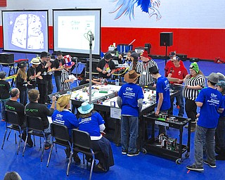 Jeff Lange | The Vindicator  Austintown's Anti-Matter competes with Robo-Chec of Akron/Hartville, Saturday afternoon during the first round of competition at Austintown Middle School.
