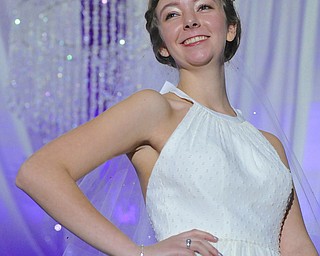 Jeff Lange | The Vindicator  Lexi Rager of Niles smiles at the crowd as she wears a dress from Galina Signature & Galina Collections, Sunday afternoon at the Eastwood Mall in Niles during the 2015 Bridal Extravaganza Fashion Show.