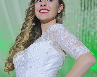 Jeff Lange | The Vindicator  Julia Lindberg of Niles smiles at the crowd while wearing a dress from the Jewel Collection, Sunday afternoon at the Eastwood Mall in Niles during the 2015 Bridal Extravaganza Fashion Show.