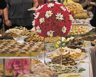 SPECIAL TO THE VINDICATOR — Above is just a glimpse of the colossal cookie collection that will await guests at the third annual Cookies & Cocktails fundraiser. The event features thousands of cookies and will take place Feb. 7 at the Tyler Mahoning Valley History Center to raise funds for exhibits and educational programs.