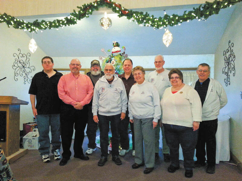 SPECIAL TO THE VINDICATOR — The Western Reserve Amateur Radio Club recently installed officers and board members for 2015 at its annual banquet. From left to right are Kevin Stein, secretary; Joe Wojtowicz, vice president; Russ Williams, trustee; Roy Haren, president; Harry Harker, trustee; Jane Avnet, web mistress and club newsletter; Allan Avnet, past president; Maureen Stein, treasurer; and Steve Fabry, trustee. Another trustee is Chris Monske. All licensed amateur radio operators and those who want to learn more about the hobby are invited to the club’s next meeting Feb. 17 at Davidson’s Restaurant, 3636 Canfield Road, Canfield. Dinner will be at 6 p.m., and the meeting will begin at 7. A presentation on programming hand-held transceivers will be given. For information call Haren at 330-717-3695 or email harens@juno.com.