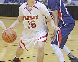 Katie Rickman | The Vindicator.Girard's Dylan O'Hara (15) moves up the court during the fourth period as JFK's AJ Grant (25) blocks him on Sat. January, 24, 2015 at the Covelli Centre.