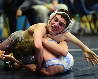 AUSTINTOWN, OHIO - JANUARY 24, 2015: Vince Mancini of Boardman gains control of the back of Spencer Dusi of Willoughby South during their 106lb third place bout Saturday evening at Fitch High School. (Photo by David Dermer/Youngstown Vindicator)